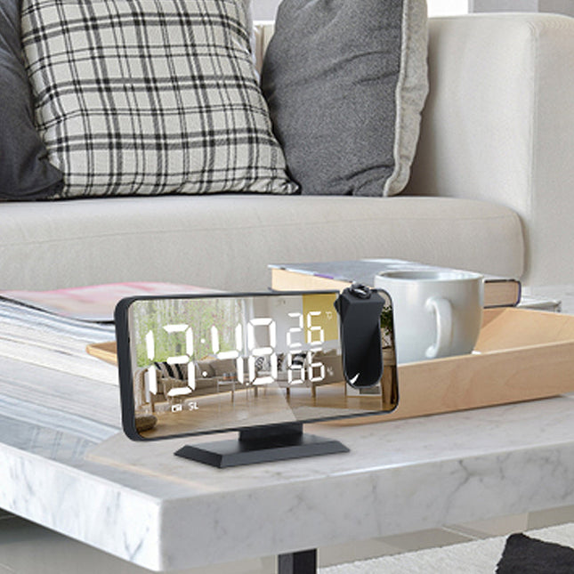Projectiewekker met radio en thermometer