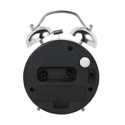 Analoge wekker met lichtgevende nummers