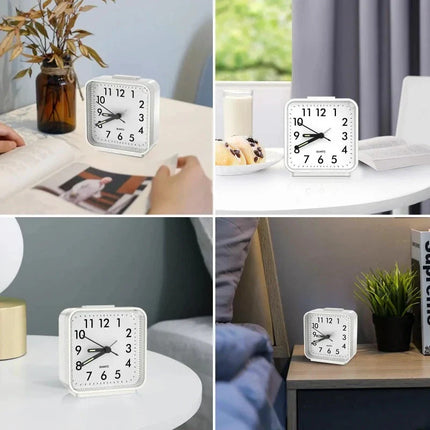 Analoge wekker met lichtgevende wijzers
