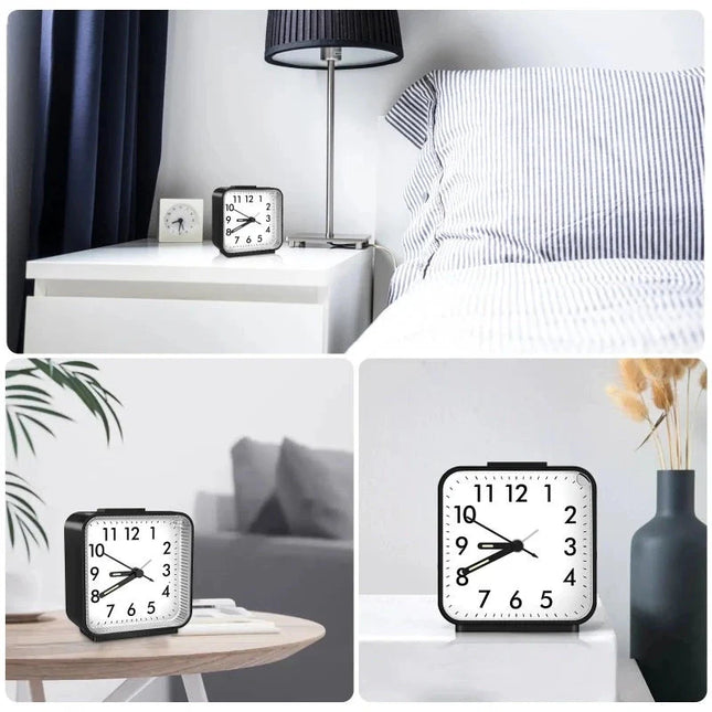 Analoge wekker met lichtgevende wijzers