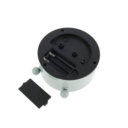 Stille analoge reiswekker met licht