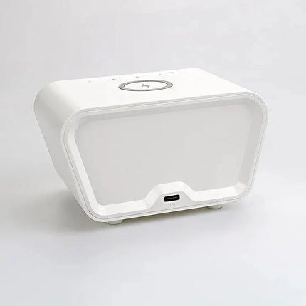 Witte wekker met inductie oplaadstation
