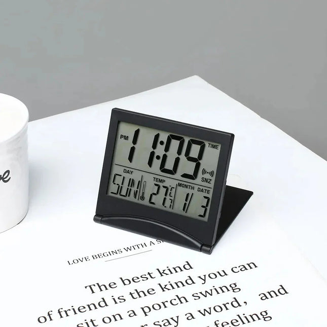 Inklapbare reiswekker voor op nachtkastje