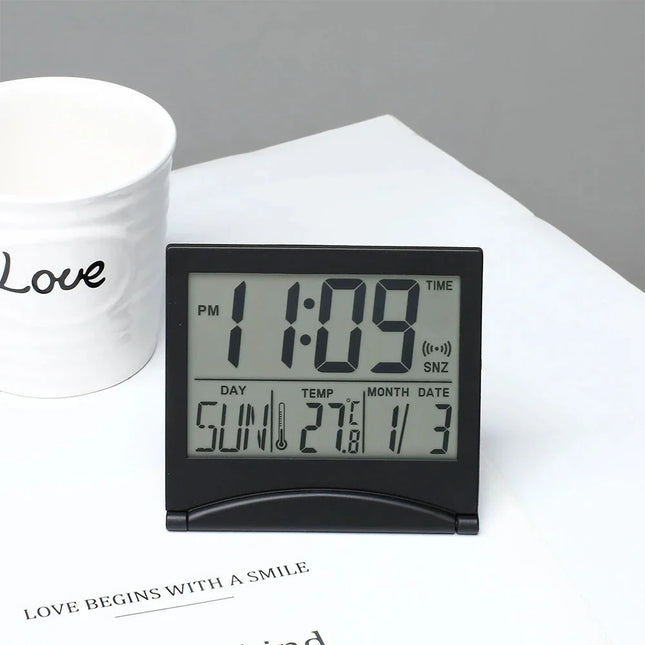 Inklapbare reiswekker voor op nachtkastje