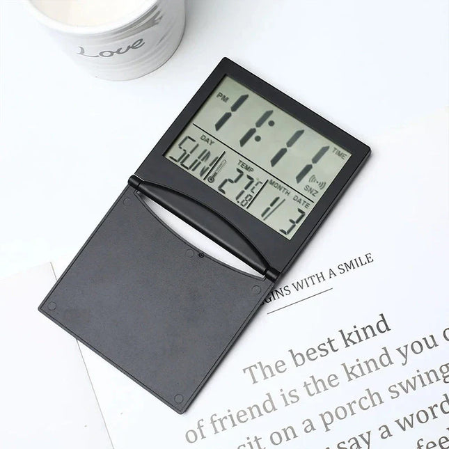 Inklapbare reiswekker voor op nachtkastje