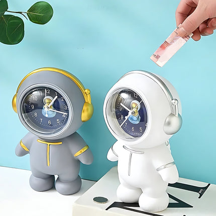 Analoge kinderwekker in astronaut vorm