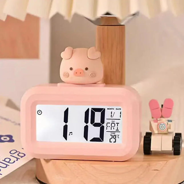 Lichtroze digitale kinderwekker met varken