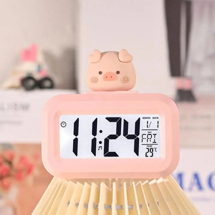 Lichtroze digitale kinderwekker met varken