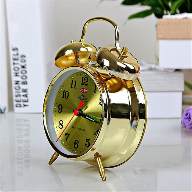 Vintage gouden wekker met bellen