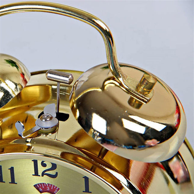 Vintage gouden wekker met bellen