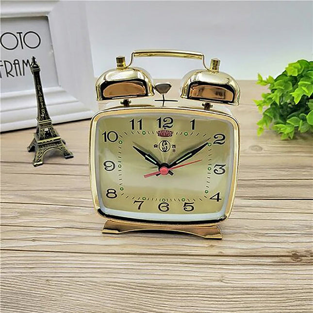 Kleine vierkante mechanische wekker goud