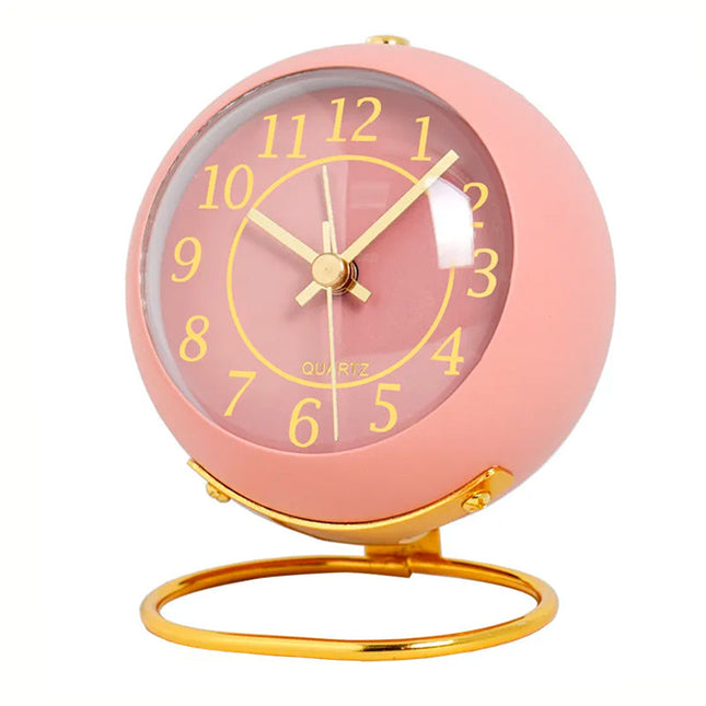 Stille ronde roze wekker vintage