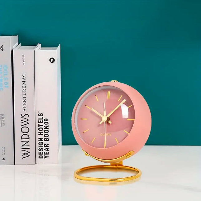 Stille ronde roze wekker vintage